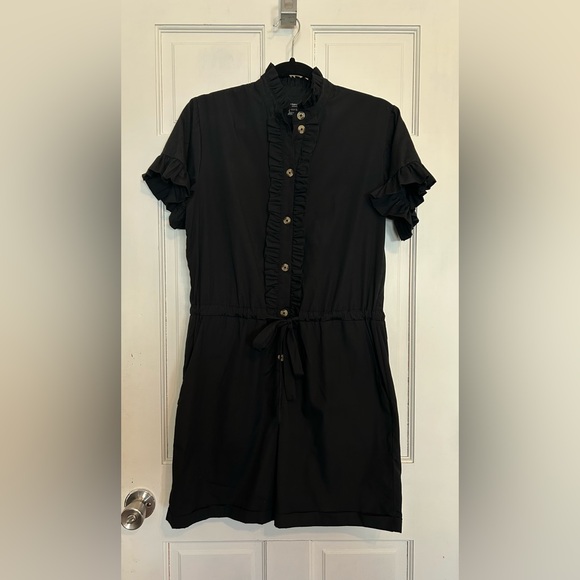 Black Ruffle Button-Up Romper - Picture 2 of 9